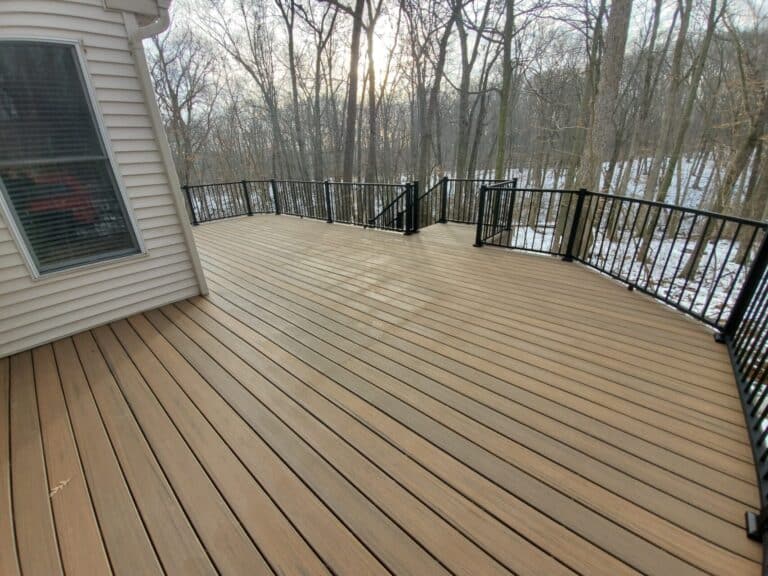 Do deck increase home value? For ROI purposes, yes, they can. A grand deck in an Ada, Michigan home.