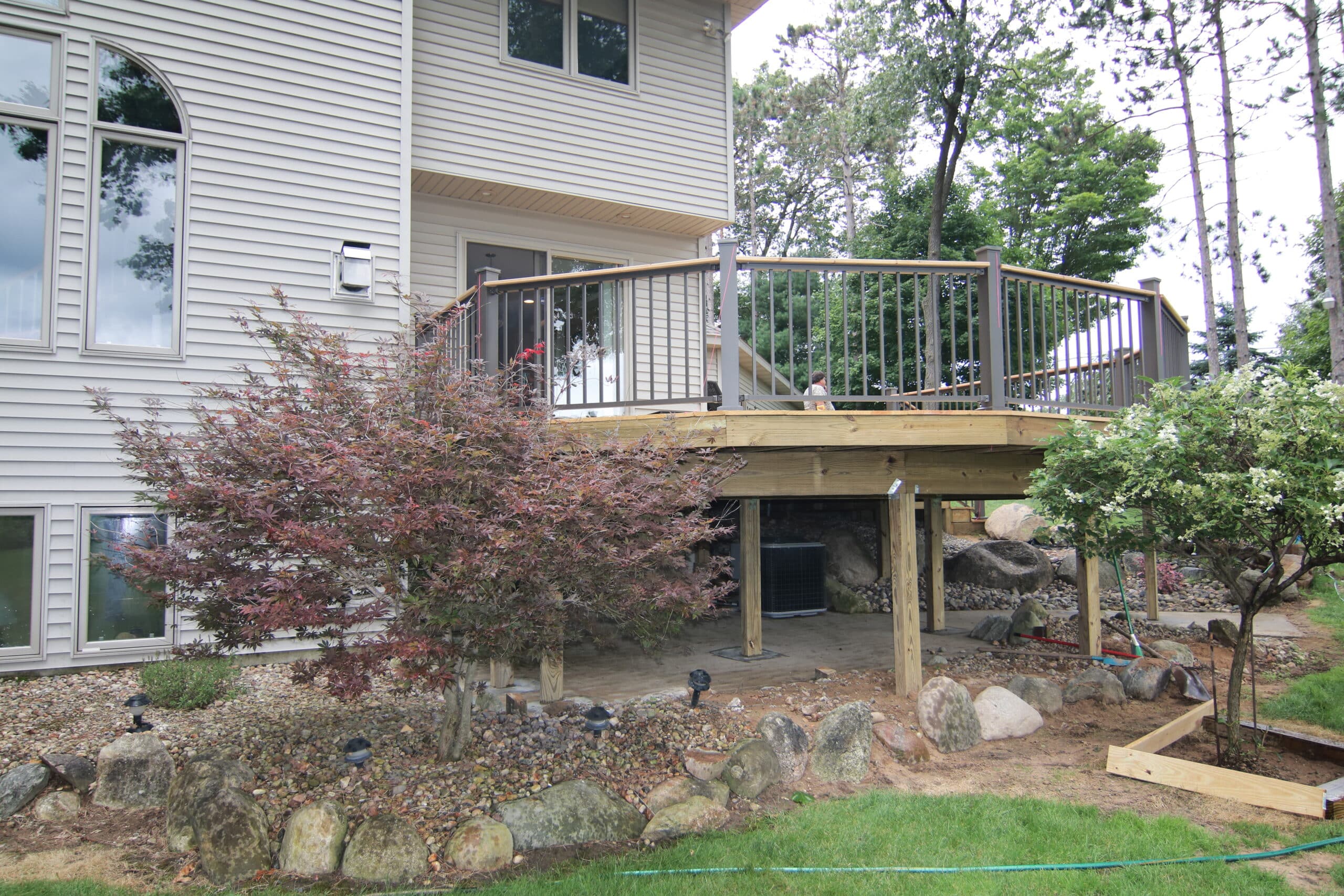 patios under deck ideas - your under-deck space is not suitable for entertaining, use it for under-deck storage