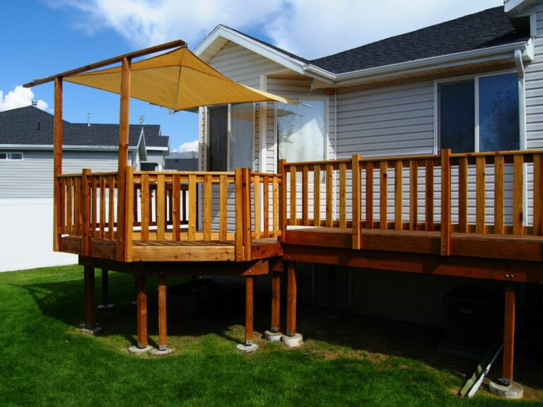 One of the types of deck upgrades is the umbrella, in this case a sail umbrella that comes over the top of the table instead of through a center hole.