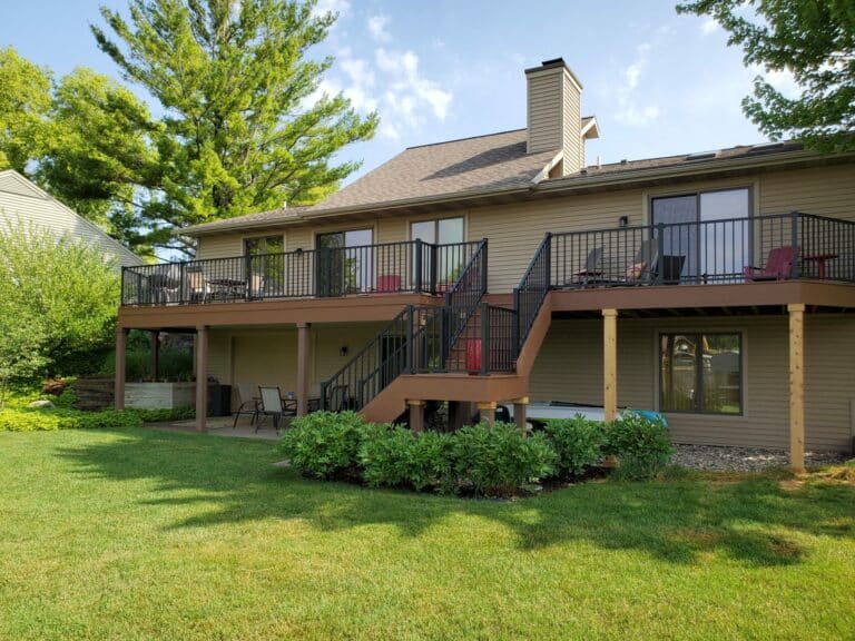 beautiful raised composite deck black railing