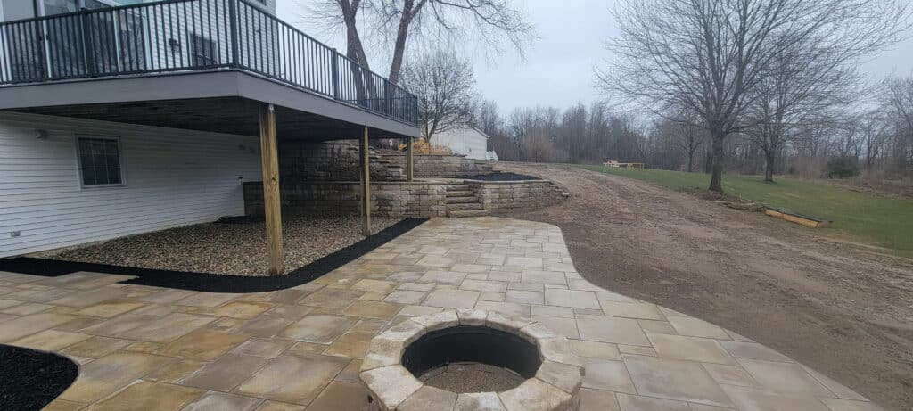 beautiful curved patio with fireplace grand rapids photo