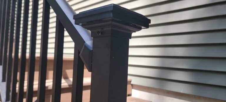 Close up photo of deck railing, deck post, and post cap