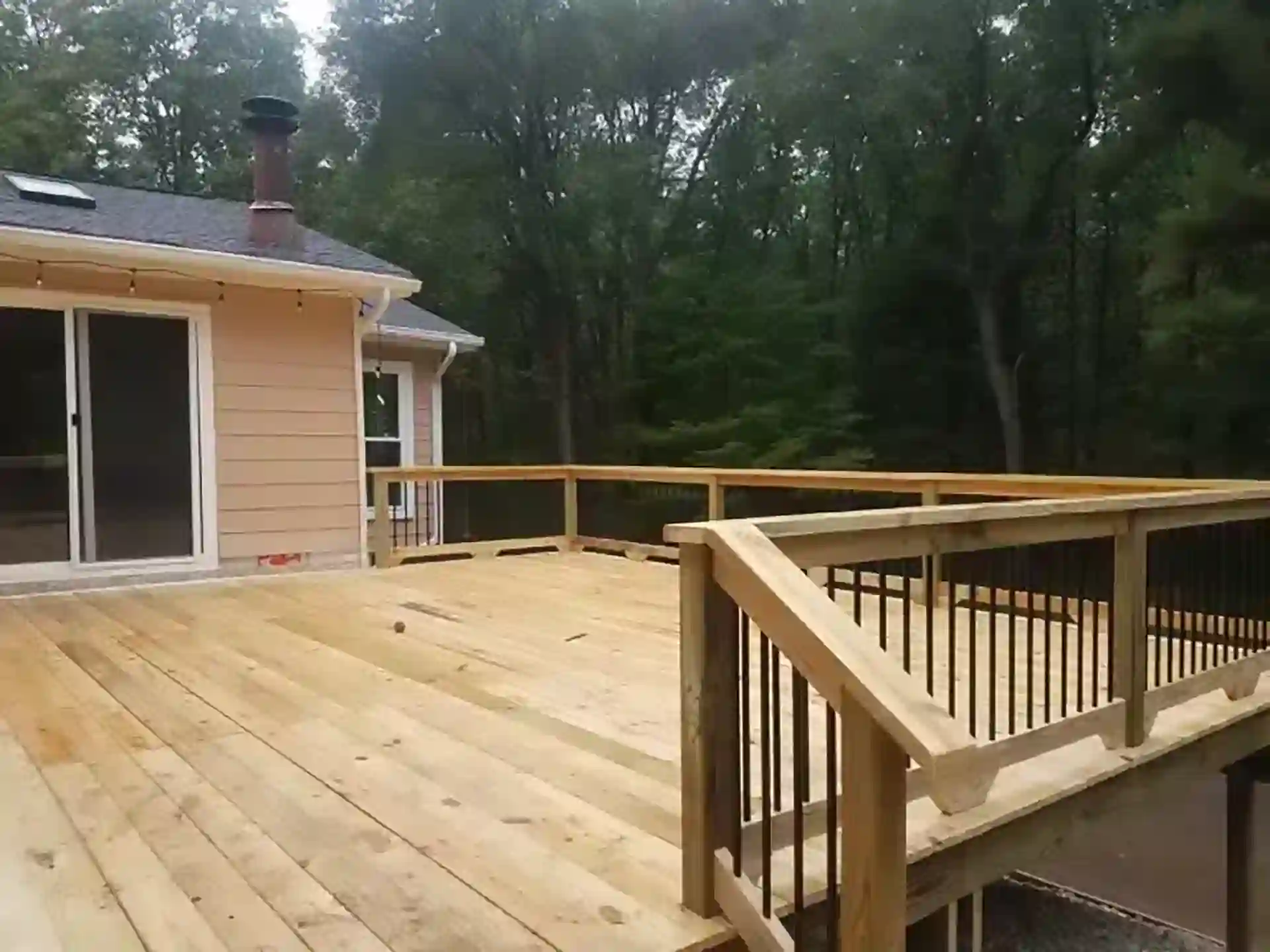 an elevated wood deck - how long wood decks last