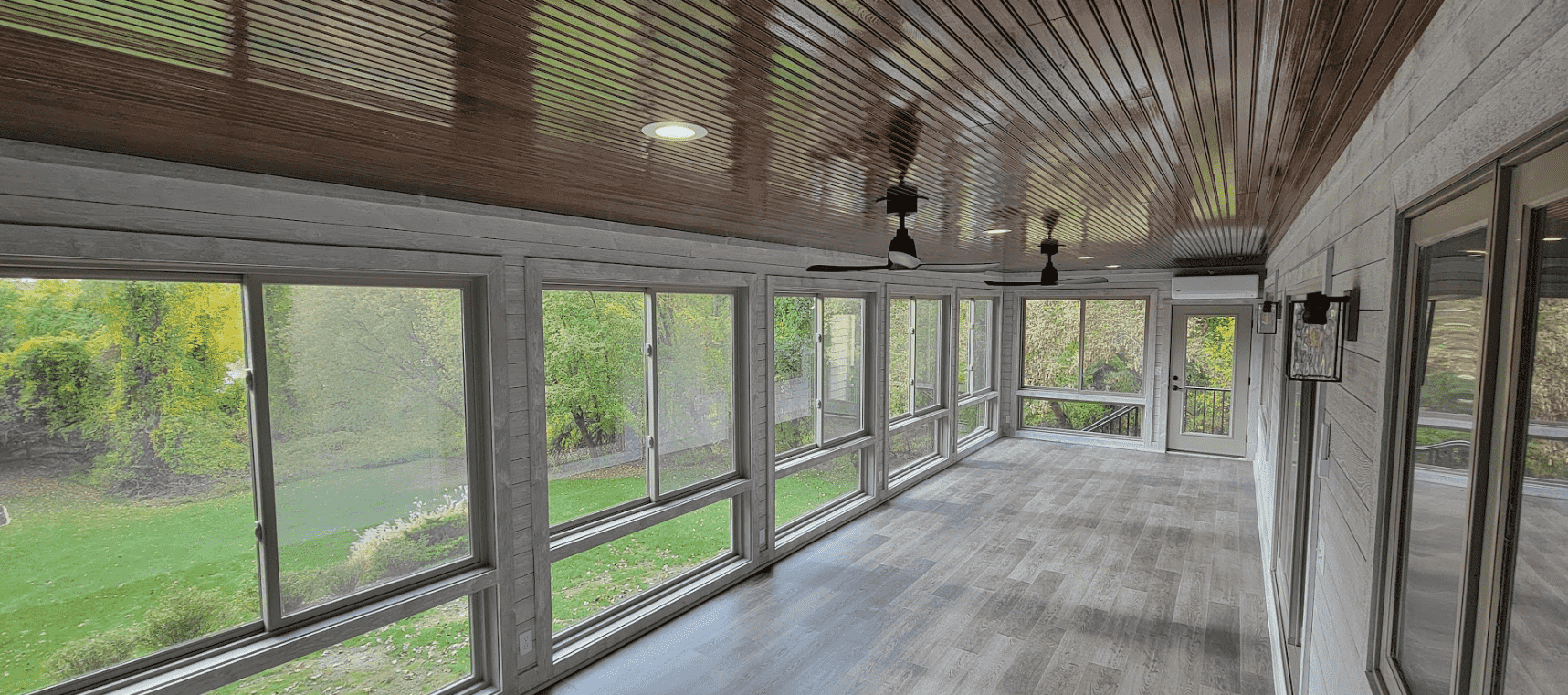 photo of an outdoor room with several windows