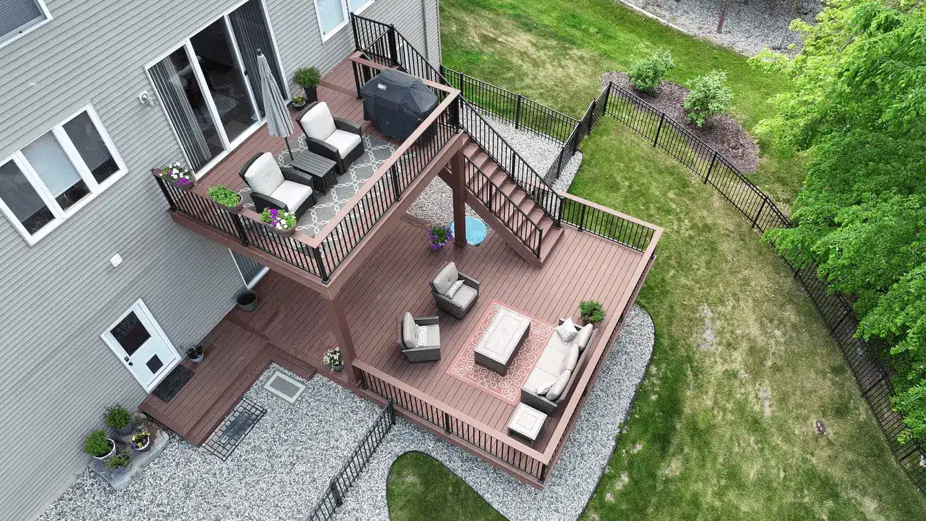 aerial photo of a multi-level deck with outdoor furniture - Winter composite deck builders in michigan