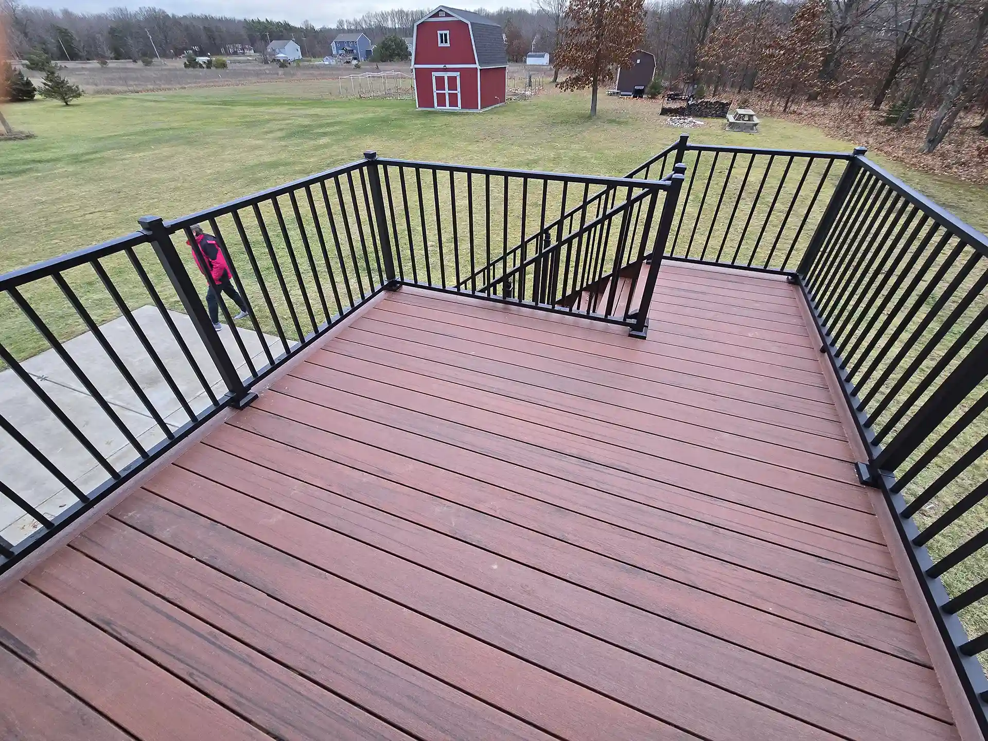 photo of an elevated composite deck made of Armadillo decking, a product people turn to when focused on the price of composite decking