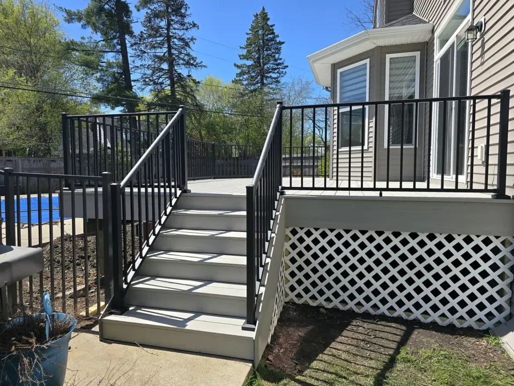 Close-up of the staircase with black Westbury railings.