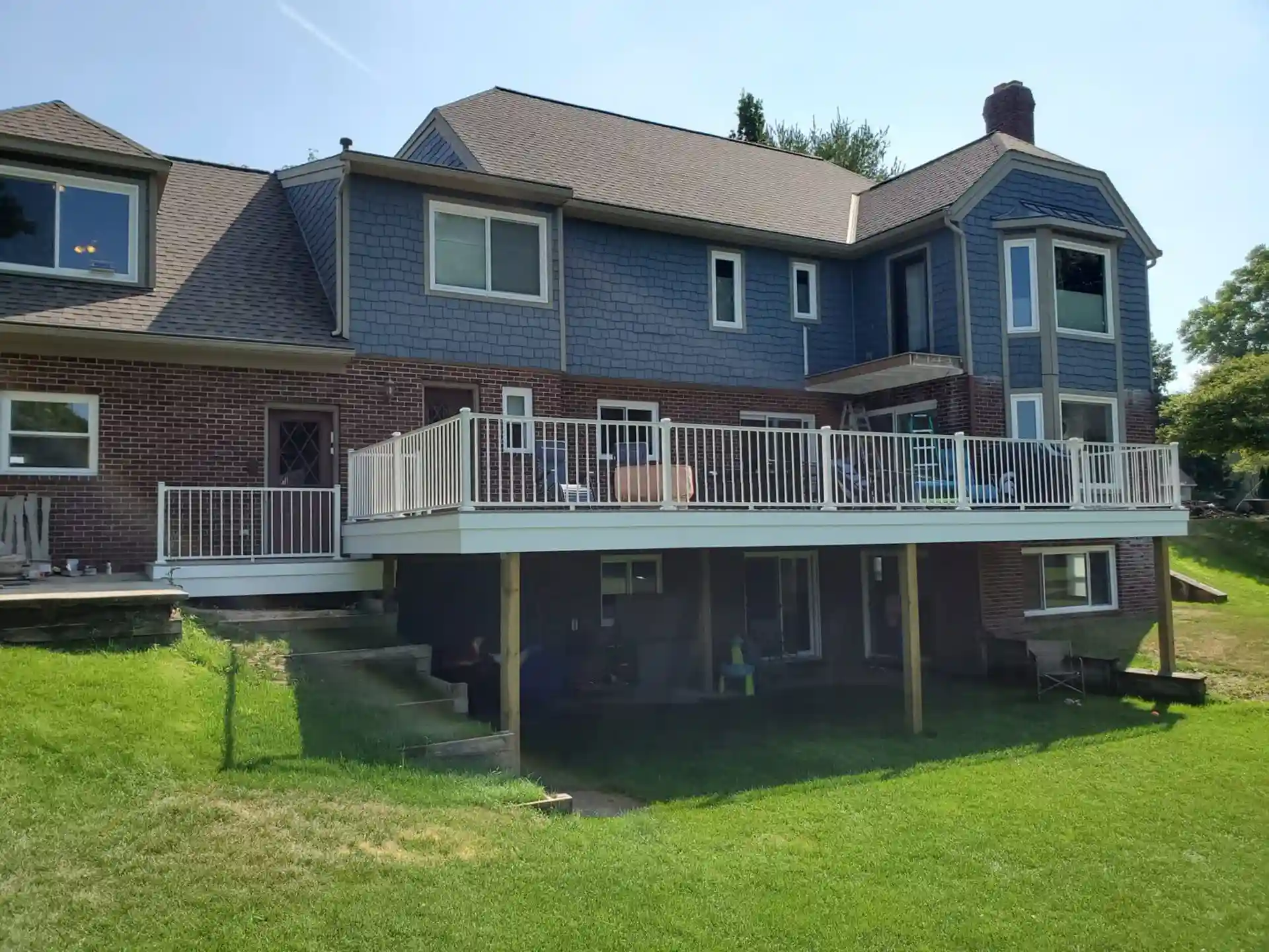 Photo of an elevated deck with deck railing
