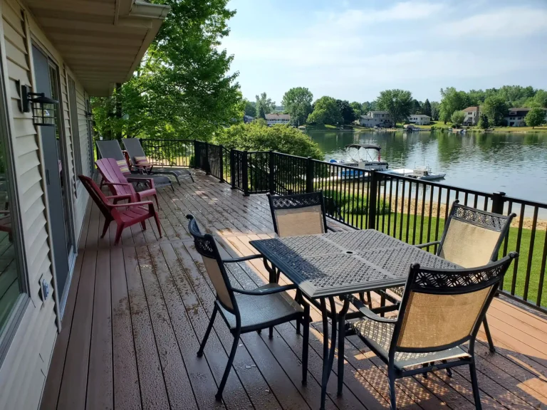 Photo of an elevated deck overlooking water.